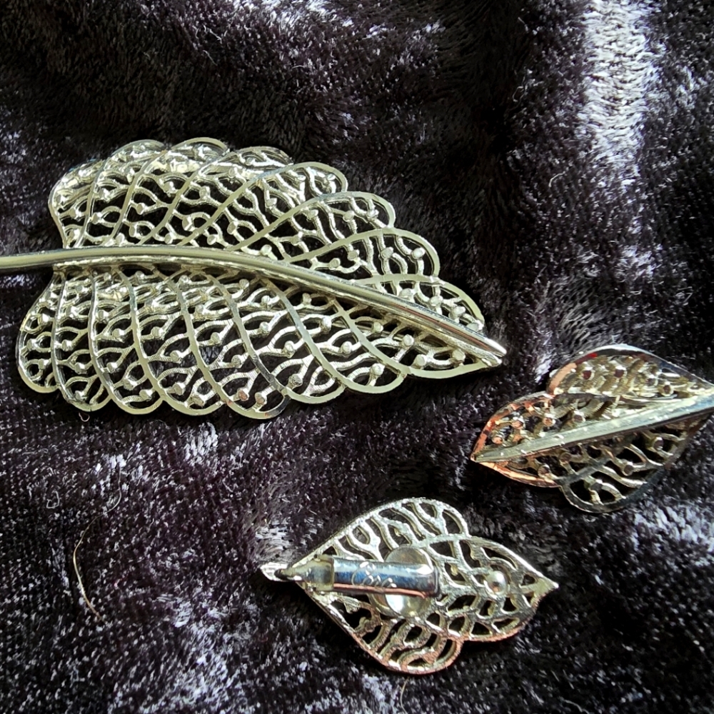Corocraft silver tone leaf brooch with matching clip on earrings